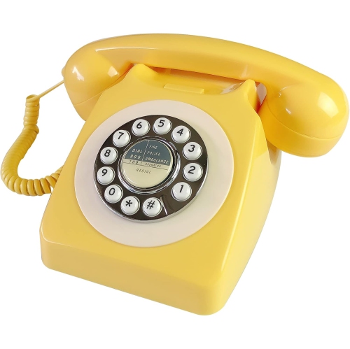Old retro telephone office landline rotary dial hotel room landline - yellow