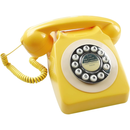 Old retro telephone office landline rotary dial hotel room landline - yellow