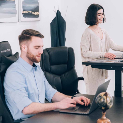 MotionGrey L Shape-Triple Motors Standing Desk with Memory Settings -71"x65" White Top Black Frame- Adjustable Sit-Stand Computer Table for Home,