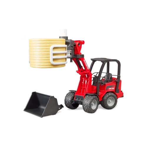 Schaeffer Compact loader 2630 with bale gripper and 1 round bale