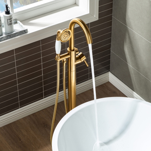 WOODBRIDGE Fusion Single Handle Floor Mount Freestanding Tub Filler Faucet with Telephone Hand shower in Brushed Gold Finish.