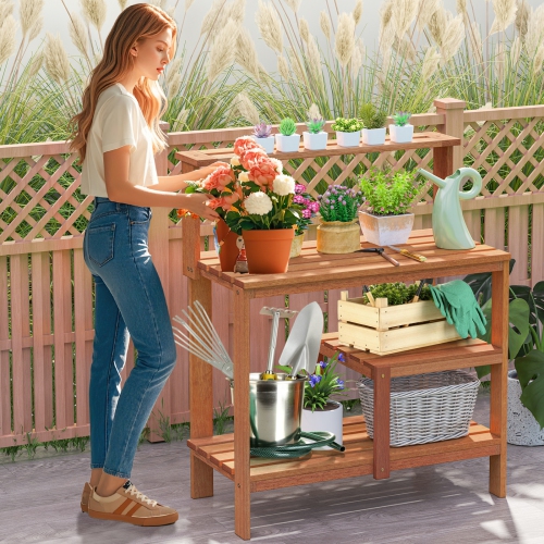 Table de travail de jardin avec tablettes en bois pour planter l'extérieur